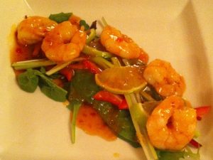 Prawn with honey glaze and fresh salad