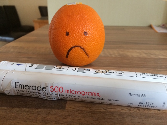 Practise by injecting expired adrenaline autoinjector pens into an orange
