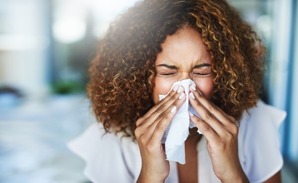 Girl sneezing. Image from iStock. Misdiagnosis of allergies
